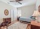 Bright bedroom with hardwood floors, ample storage, and plenty of natural light at 9740 Sw 68Th Ln, Ocala, FL 34481