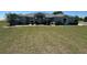 Inviting single story home with a large front yard and a meticulously maintained lawn at 9934 Se 64Th Ave, Belleview, FL 34420