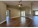Bright and open living room featuring vaulted ceilings and wood floors at 9934 Se 64Th Ave, Belleview, FL 34420