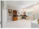 Bright home office featuring multiple desks, a ceiling fan, and ample natural light creating a great working space at 10033 Sw 96Th St, Ocala, FL 34481