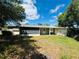 Spacious backyard features a screen porch and utility shed with a serene and private outdoor space at 10081 Sw 93Rd Ave, Ocala, FL 34481