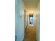 Hallway with carpet, leading to other rooms at 10081 Sw 93Rd Ave, Ocala, FL 34481