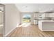 Modern kitchen area with lots of natural light and vinyl floors, perfect for cooking and dining at 10869 Sw 140Th Ave, Dunnellon, FL 34432