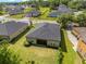 Aerial view of the property showcasing the backyard, home exterior, and neighborhood at 1119 Se 42Nd Rd, Ocala, FL 34480