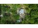 Birds-eye perspective of house showing the roof, surroundings, and detached building at 11311 Ne 40Th Street Rd, Silver Springs, FL 34488