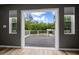 View from the deck that looks out over a wooded and grassy landscape at 11311 Ne 40Th Street Rd, Silver Springs, FL 34488
