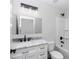 Bathroom featuring a tub, shower, vanity, mirror, and lighting at 11415 Nw 15Th St, Ocala, FL 34482