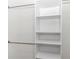 This closet has four shelves and two metal clothing rods at 11415 Nw 15Th St, Ocala, FL 34482