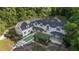 Private residence featuring a pool and mature landscaping and trees at 1251 Sw 43Rd Pl, Ocala, FL 34471