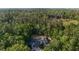 Secluded estate featuring mature trees and an estate home with acreage at 1251 Sw 43Rd Pl, Ocala, FL 34471