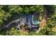 Expansive property with a pool, mature landscaping, and a long, winding driveway at 1251 Sw 43Rd Pl, Ocala, FL 34471