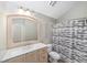 Bathroom featuring a vanity, toilet, and a shower with a shower curtain at 1251 Sw 43Rd Pl, Ocala, FL 34471