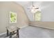 Bedroom featuring two windows and a ceiling fan at 1251 Sw 43Rd Pl, Ocala, FL 34471