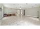Large room features tile flooring, white trim, and ample space at 1251 Sw 43Rd Pl, Ocala, FL 34471