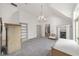Spacious bonus room with high ceilings, fireplace, and gray carpeting at 1251 Sw 43Rd Pl, Ocala, FL 34471