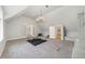 Spacious bonus room with chandelier, high ceilings, carpet flooring, and built in storage at 1251 Sw 43Rd Pl, Ocala, FL 34471