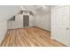 Closet with hardwood flooring and built-in shelving and drawers for optimal storage solutions at 1251 Sw 43Rd Pl, Ocala, FL 34471