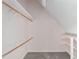 Walk-in closet with built in shelving and wooden rods to hang clothing at 1251 Sw 43Rd Pl, Ocala, FL 34471