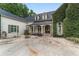Inviting entrance with a stone path, covered porch, and lush greenery at 1251 Sw 43Rd Pl, Ocala, FL 34471