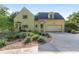 Charming two-story home with a well-maintained yard, garage, and meticulous landscaping at 1251 Sw 43Rd Pl, Ocala, FL 34471