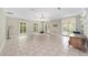 Large tiled bonus room with multiple windows providing plenty of natural light at 1251 Sw 43Rd Pl, Ocala, FL 34471