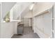 Spacious walk-in closet with custom shelving and a window at 1251 Sw 43Rd Pl, Ocala, FL 34471