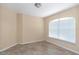 Neutral-toned bedroom featuring a tile floor, base trim, and one window at 13173 Sw 65Th Cir, Ocala, FL 34473