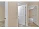 Hallway with tile flooring and white doors at 13173 Sw 65Th Cir, Ocala, FL 34473