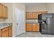 Bright kitchen features granite countertops and stainless steel appliances at 13173 Sw 65Th Cir, Ocala, FL 34473