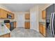 Well-equipped kitchen showcasing ample counter space and stainless steel appliances at 13173 Sw 65Th Cir, Ocala, FL 34473