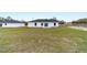 This backyard shows the ample area for outdoor activities at 13344 Sw 112 Pl, Dunnellon, FL 34432