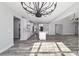 Bright modern kitchen with lots of light, an island, and wood floors at 14115 Nw 141St Ave, Williston, FL 32696