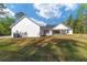 Side of house with AC unit and lawn at 14115 Nw 141St Ave, Williston, FL 32696
