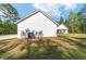 Side of house with AC unit and lawn at 14115 Nw 141St Ave, Williston, FL 32696