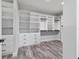 Spacious walk-in closet with custom shelves, drawers, and ample storage space at 14115 Nw 141St Ave, Williston, FL 32696