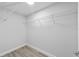 Walk-in closet with built-in shelving offering ample storage and organization space at 15840 Sw 38 Pl, Ocala, FL 34481