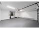Spacious garage features painted walls and floors, plus garage door opener at 15840 Sw 38 Pl, Ocala, FL 34481