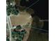 Aerial view of lakeside property with docks and community amenities at 22764 Sw Sea Cliff Ave, Dunnellon, FL 34431