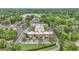 Scenic aerial view of the condo community surrounded by lush greenery and mature trees at 2837 Ne 3Rd St # 103, Ocala, FL 34470