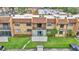 Overhead view of a condominium featuring well-maintained landscaping and convenient parking at 2837 Ne 3Rd St # 103, Ocala, FL 34470