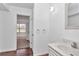 Bathroom featuring modern fixtures and a marble-topped vanity at 2837 Ne 3Rd St # 103, Ocala, FL 34470