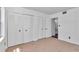 Bedroom featuring closets and access to a bathroom at 2837 Ne 3Rd St # 103, Ocala, FL 34470