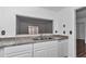 Bright kitchen with granite countertops, modern stainless steel sink, and a functional breakfast bar at 2837 Ne 3Rd St # 103, Ocala, FL 34470