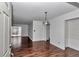 Inviting living room with new hardwood floors and slider doors for seamless indoor/outdoor living at 2837 Ne 3Rd St # 103, Ocala, FL 34470