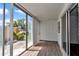Sunroom with large glass doors brings the outdoors in with natural light and serene views at 2837 Ne 3Rd St # 103, Ocala, FL 34470