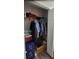 Closet with clothes rack, assorted hanging shirts, and additional storage in the base at 2843 Ne 3Rd St # 109, Ocala, FL 34470