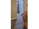 Dining area with wood-look floors leads to kitchen with stainless appliances at 2843 Ne 3Rd St # 109, Ocala, FL 34470