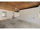 Covered carport area with concrete flooring provides shelter and access to the home's entrance at 4410 Ne 13Th St, Ocala, FL 34470