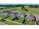 Aerial view of a fenced backyard featuring a well-maintained lawn and trampoline, nestled in a serene neighborhood setting at 4806 Sw 86Th Ln, Ocala, FL 34476