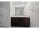 Bathroom features a modern double sink vanity with a white countertop and espresso colored cabinets at 4806 Sw 86Th Ln, Ocala, FL 34476